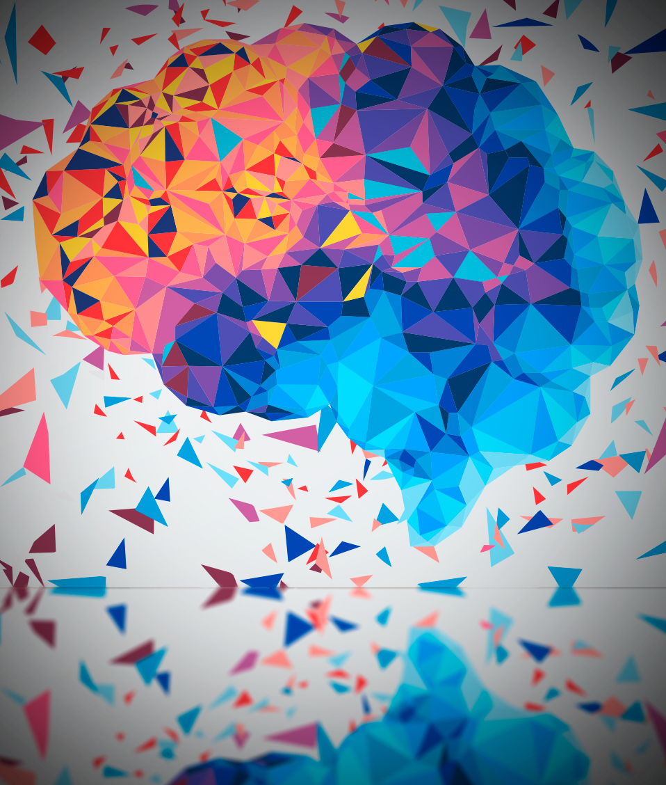 Cerebro humano abstracto formado con triángulos de colores